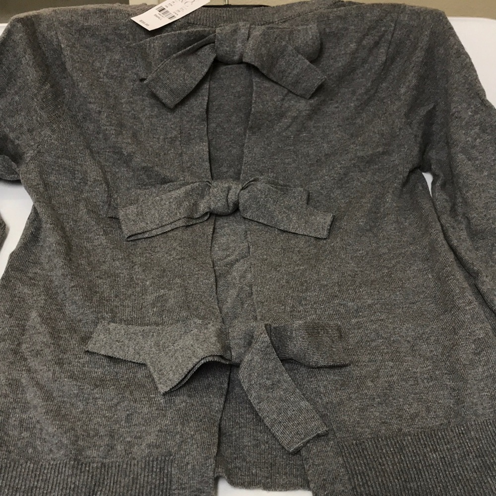 New beautiful light ladies sweater.